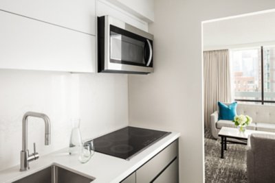 kitchen area in studio kitchenette at chelsea hotel, toronto